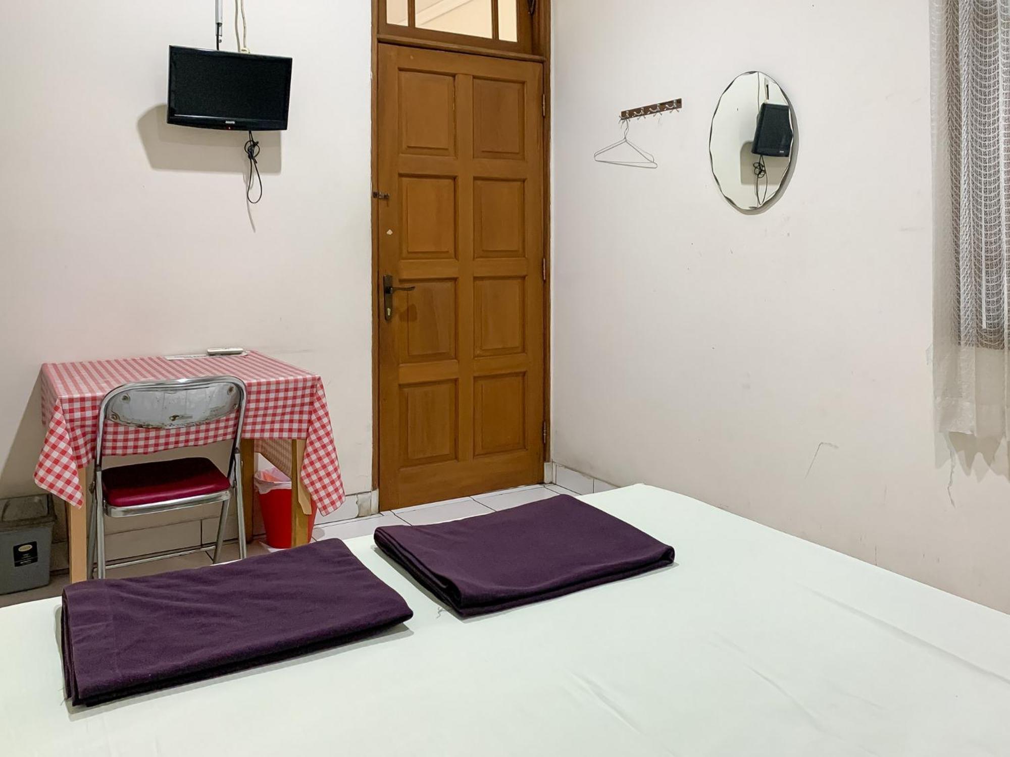 Cozy Mitra Reddoorz 2*