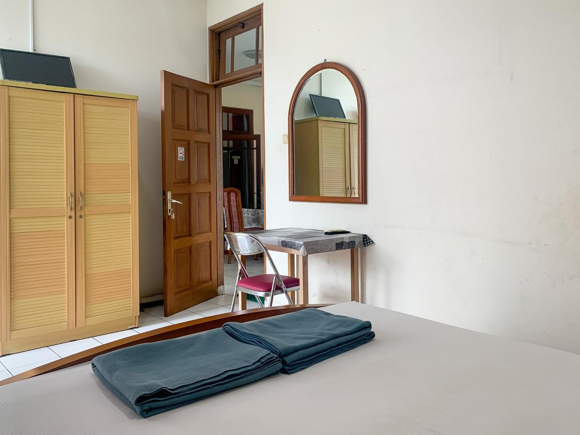 Cozy Mitra Reddoorz 2*